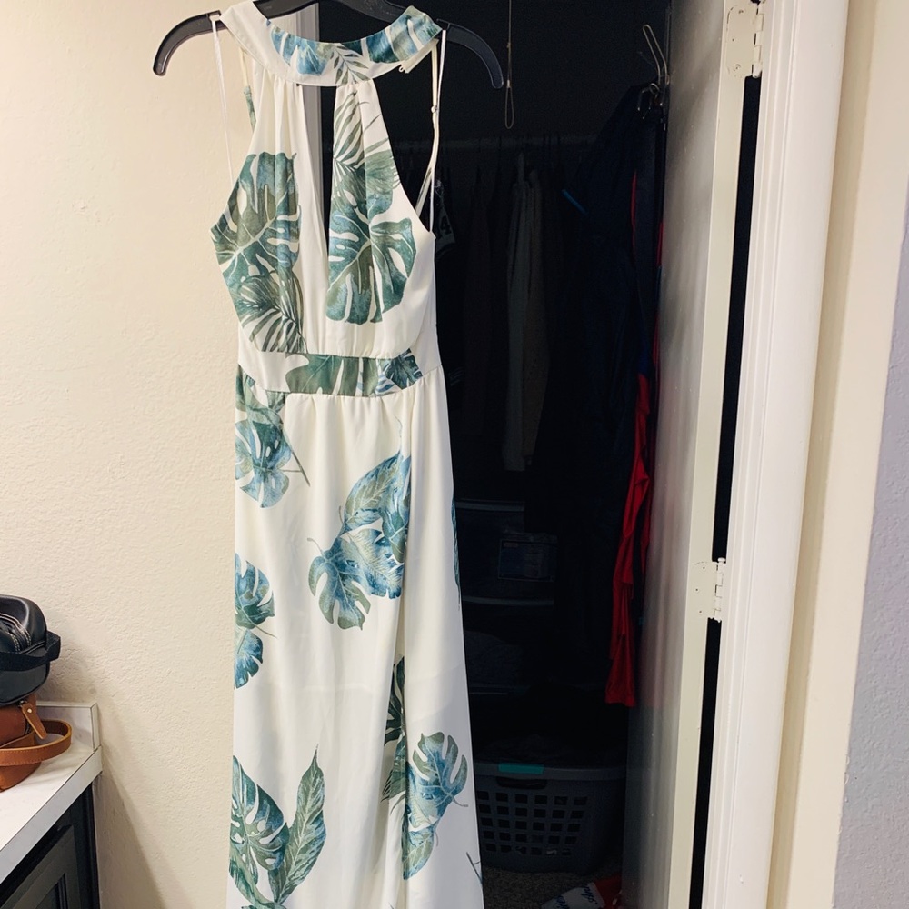 Vestique Maxi dress size M. Leg slit & open back.